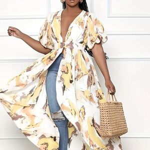 Flowy, bohemian, floral, short voluminous sleeved kaftan. Easy breezy.